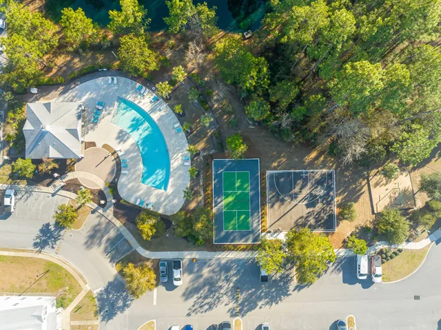 a view of a swimming pool with a lounge chairs