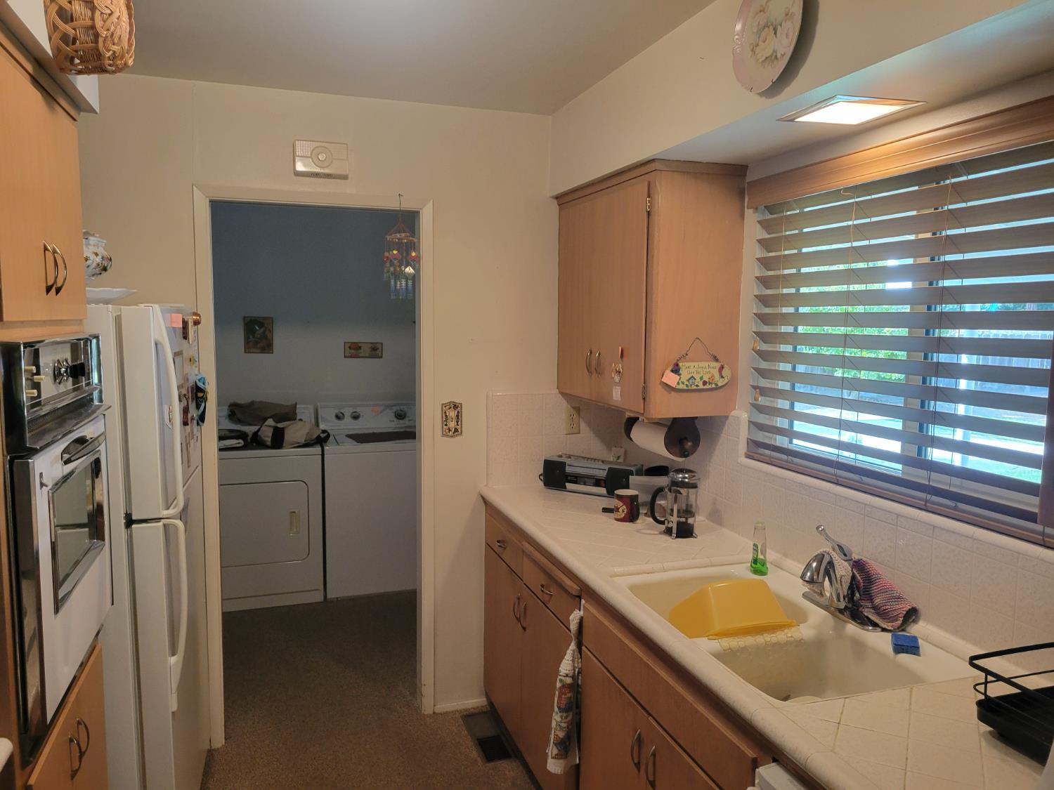 318 Williams Madera, CA 93637 - Photo 12 of 25 a bathroom with a tub sink and mirror