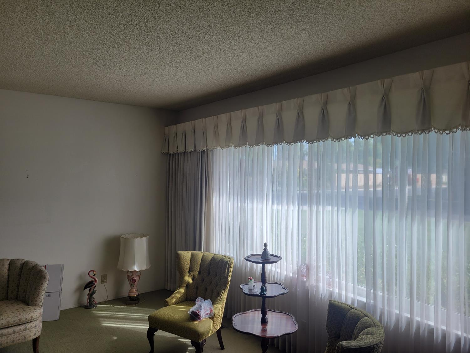 318 Williams Madera, CA 93637 - Photo 4 of 25 a living room with furniture and two window