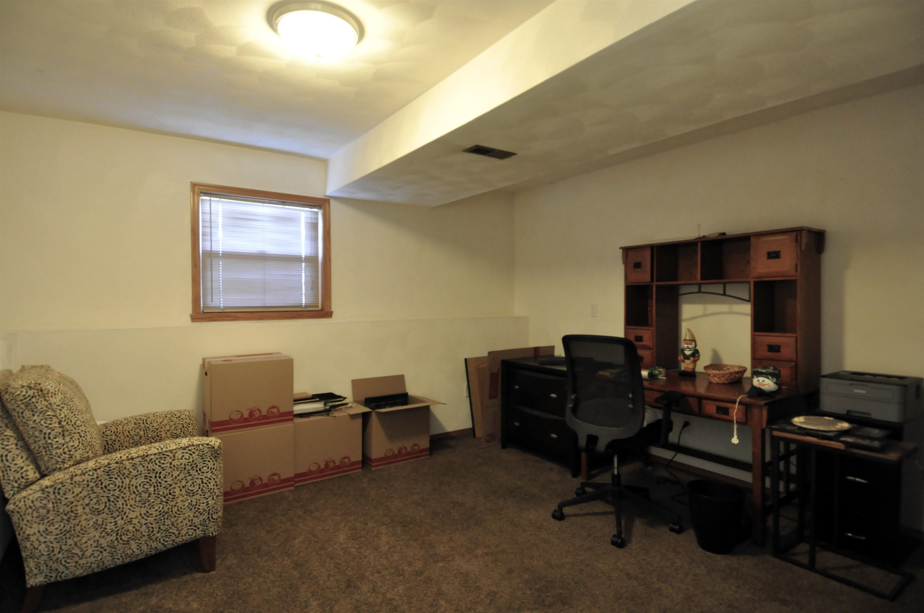 518 Merilot Drive Roscoe, IL 61073 - Photo 12 of 26 a view of a livingroom with workspace and a couch