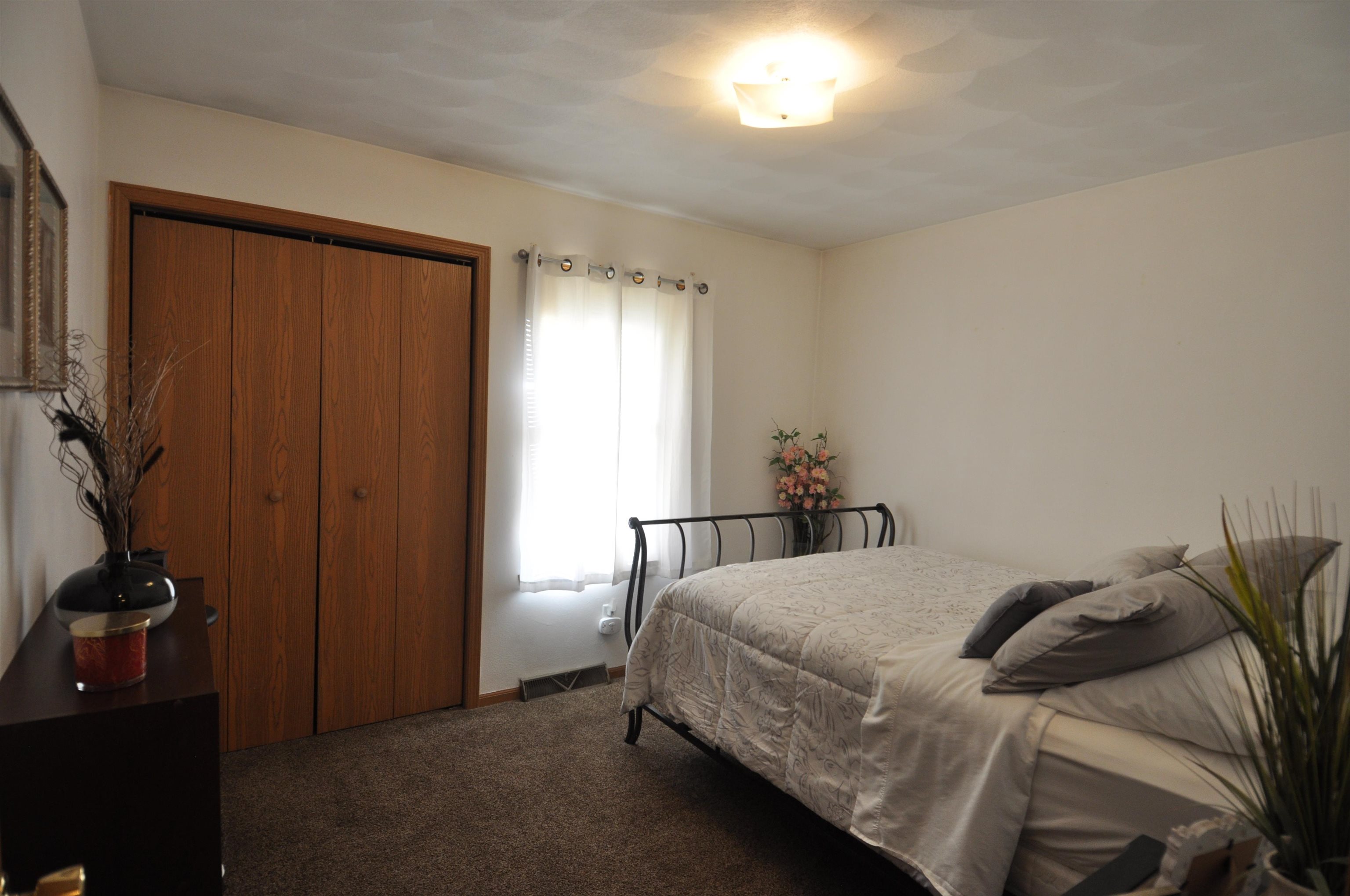 518 Merilot Drive Roscoe, IL 61073 - Photo 17 of 26 a bedroom with a bed and a closet