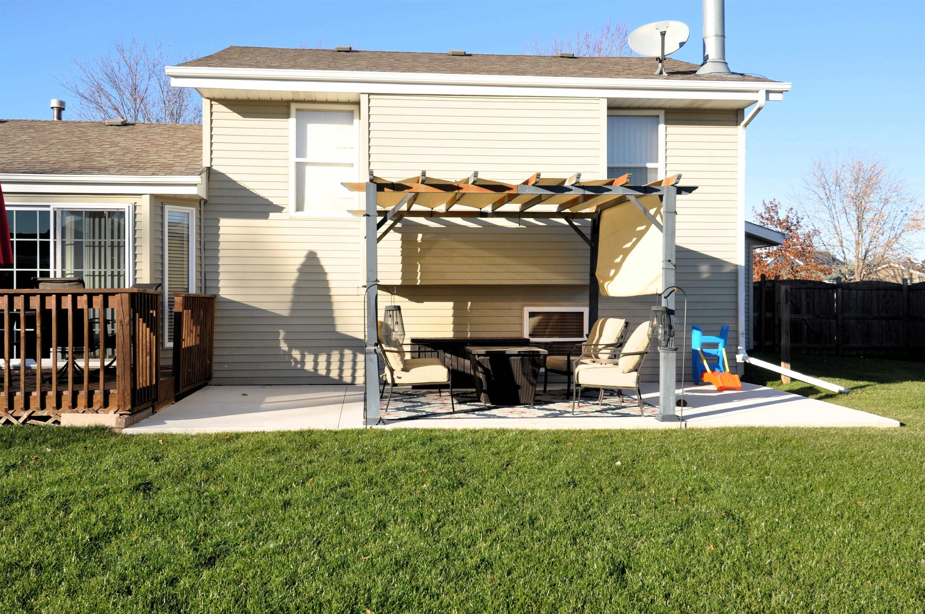 518 Merilot Drive Roscoe, IL 61073 - Photo 23 of 26 a view of a house with backyard and porch