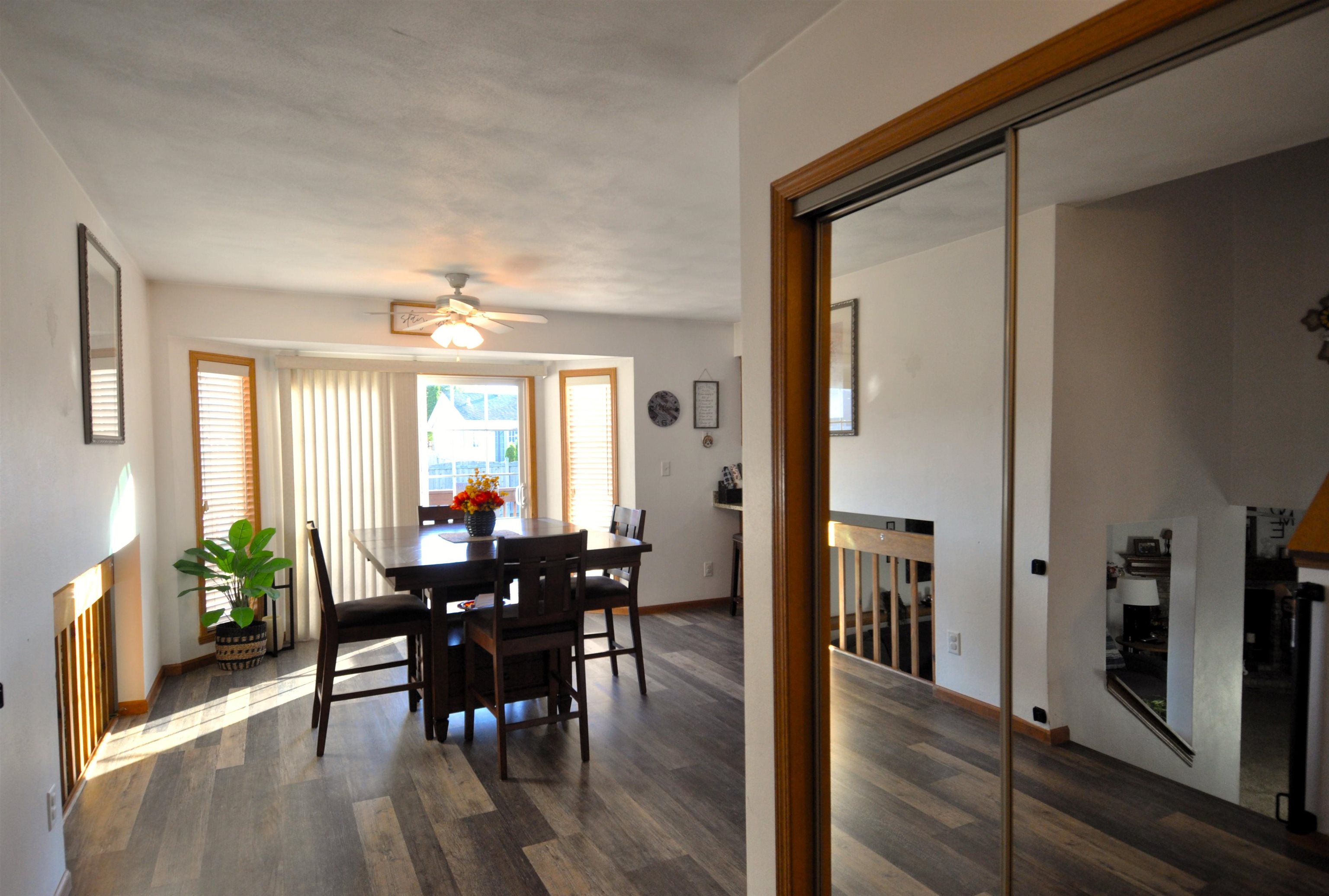 518 Merilot Drive Roscoe, IL 61073 - Photo 4 of 26 a view of a dining room with furniture and chandelier