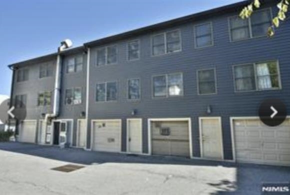 a front view of a building with a glass door
