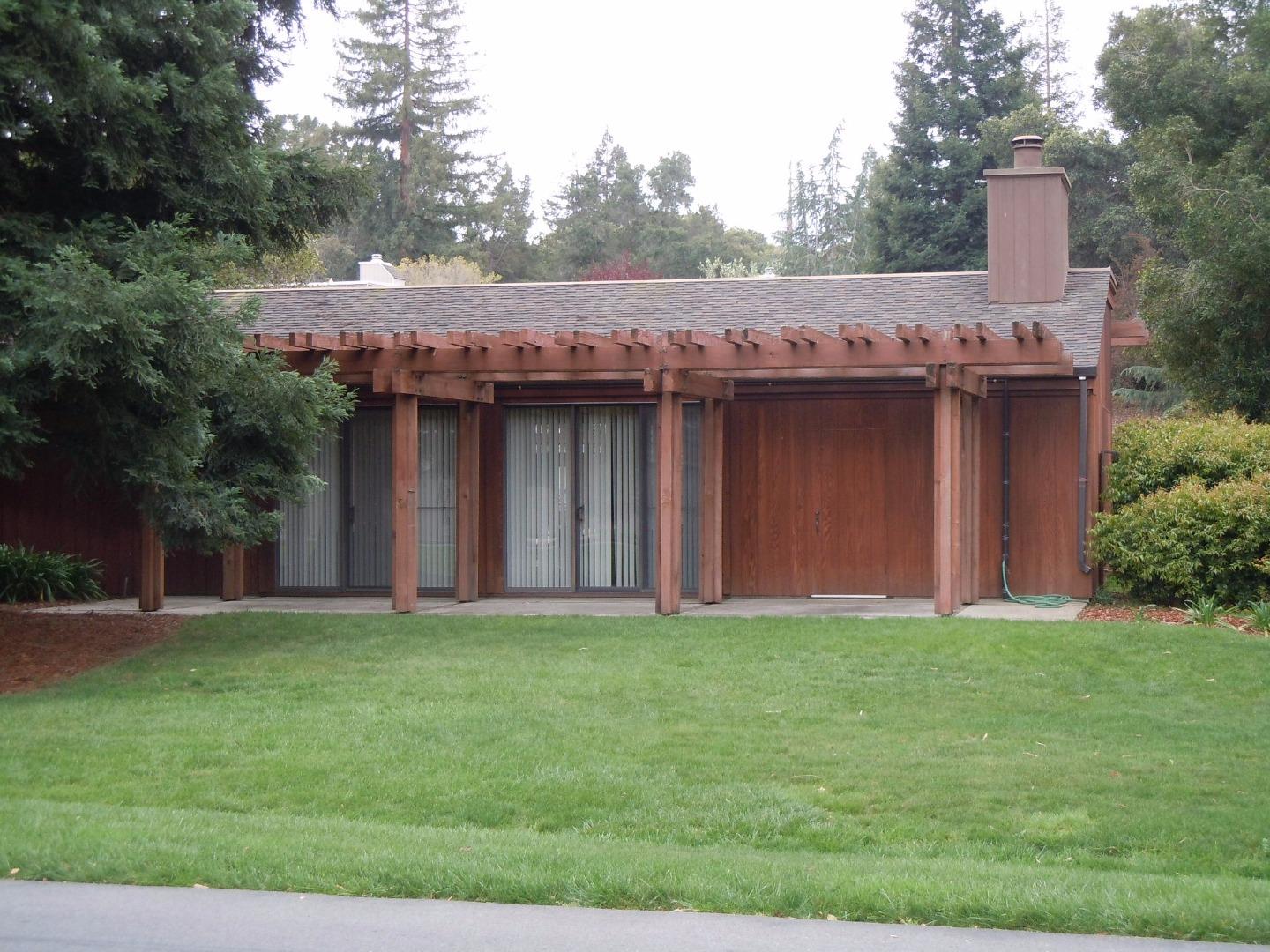 6 Farm Road Los Altos, CA 94024 - Photo 8 of 21 a view of a tiny house with a yard