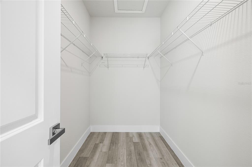 16082 Southwest 35th Court Road Ocala, FL 34473 - Photo 17 of 32 a view of a room with racks on the wall