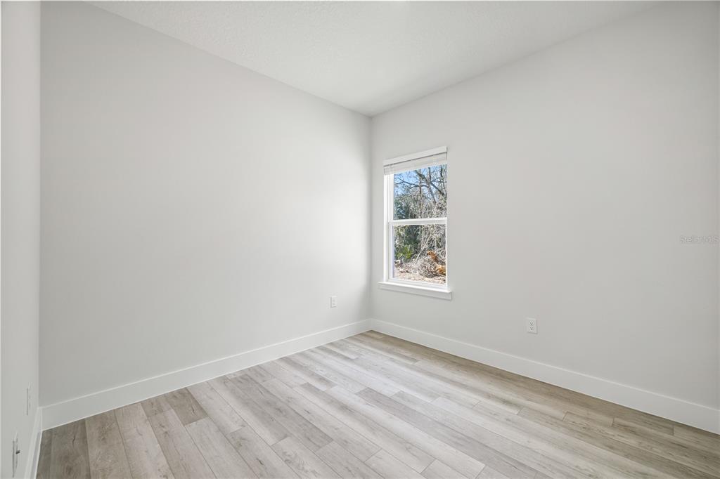 16082 Southwest 35th Court Road Ocala, FL 34473 - Photo 23 of 32 an empty room with a window