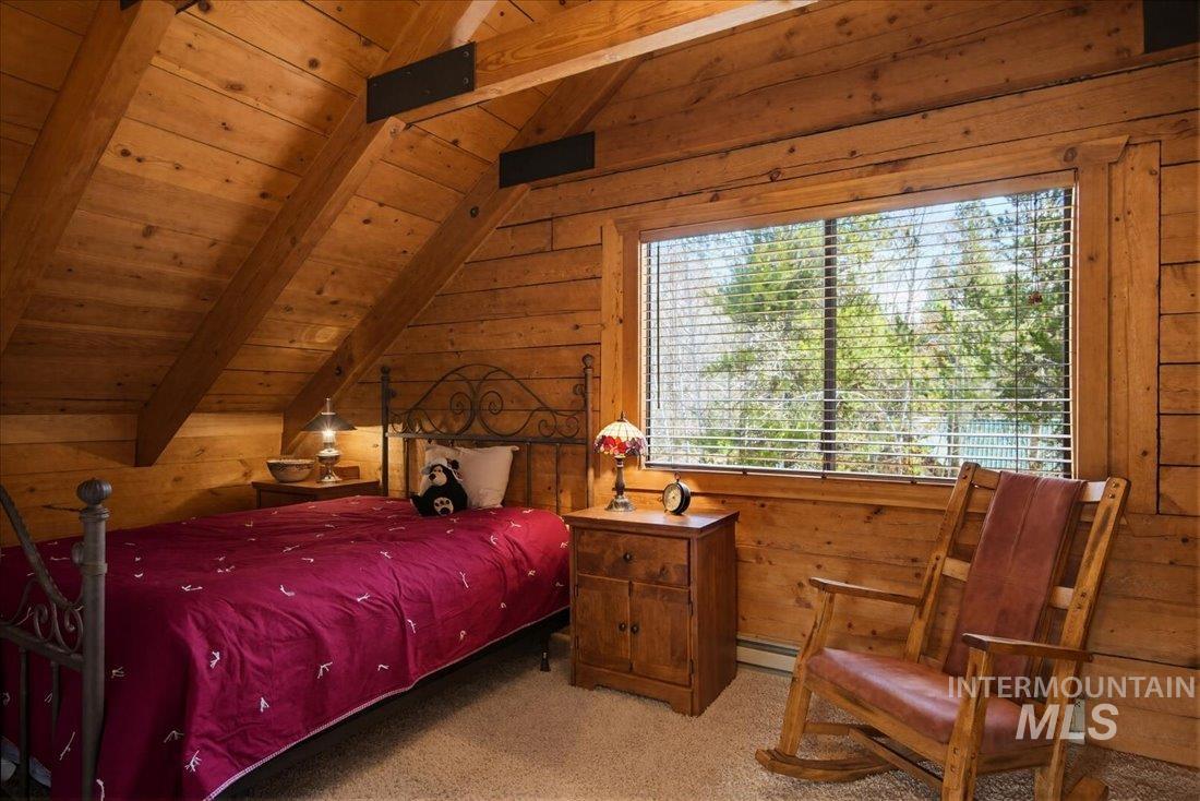 143 East Lk Frk Road McCall, ID 83638 - Photo 18 of 49 Featuring wood walls and high ceilings with exposed beams
