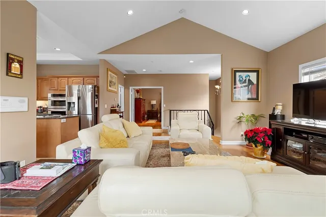 a bedroom with a bed and flat screen tv