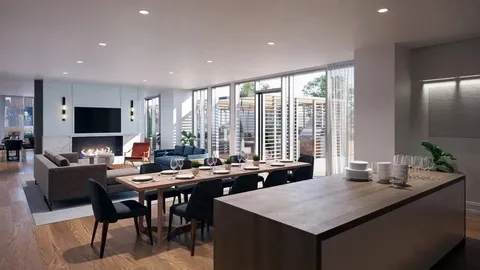 a kitchen with sink and view of living room