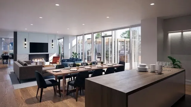 a kitchen with sink and view of living room