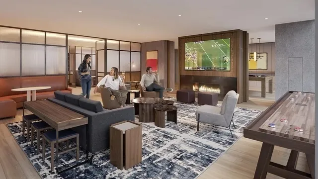 a living room with furniture kitchen view and a large window