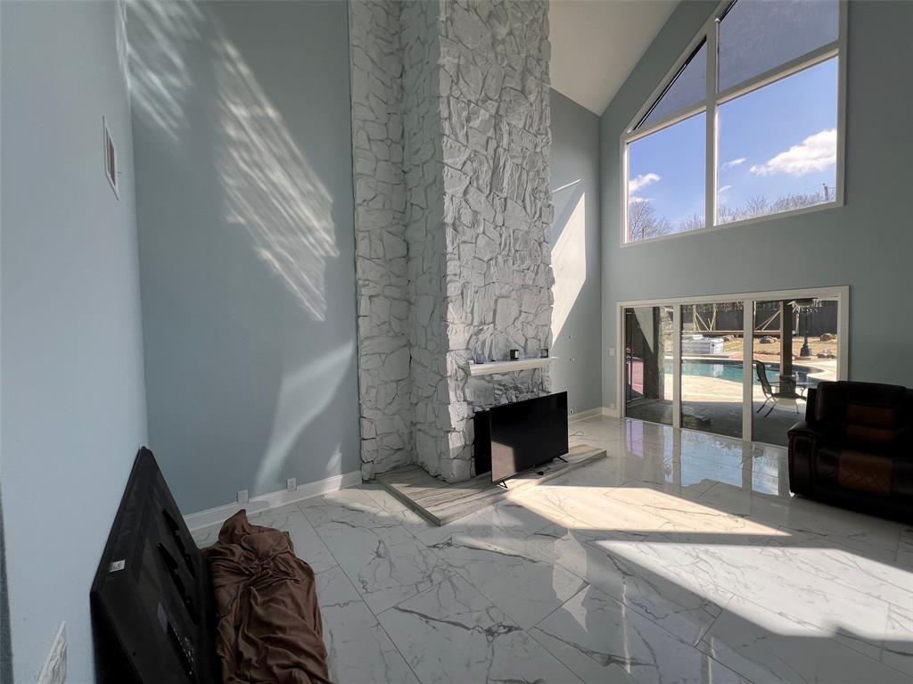 5890 Montgomery Road Midlothian, TX 76065 - Photo 13 of 38 a bedroom with a bed and chair