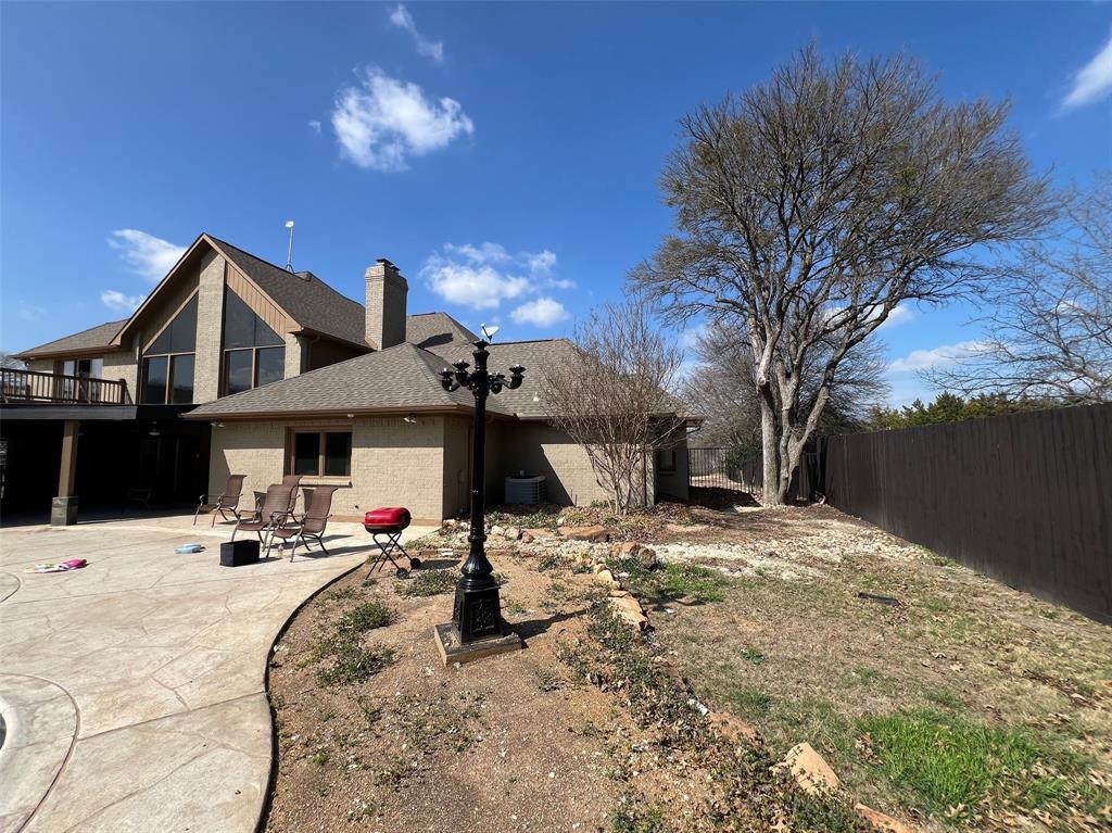 5890 Montgomery Road Midlothian, TX 76065 - Photo 24 of 38 a view of a house with snow in the yard