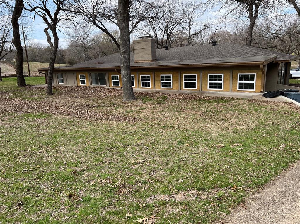 5890 Montgomery Road Midlothian, TX 76065 - Photo 30 of 38 a front view of a house with yard