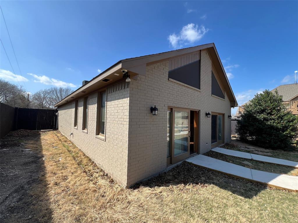 5890 Montgomery Road Midlothian, TX 76065 - Photo 10 of 38 a front view of a house with a yard