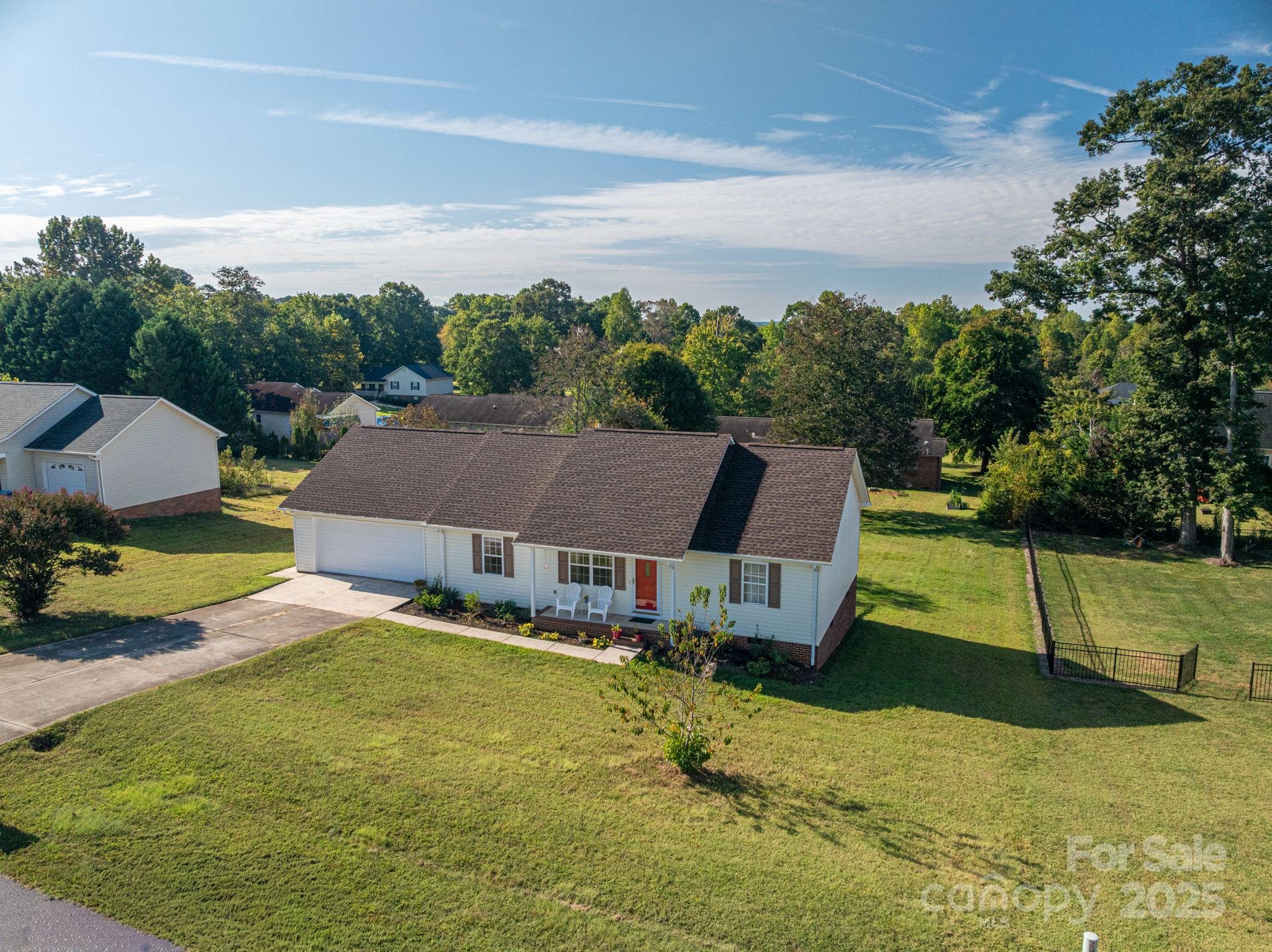 1371 Millrace Drive Conover, NC 28613 - Photo 2 of 36 a view of house with garden space and swimming pool