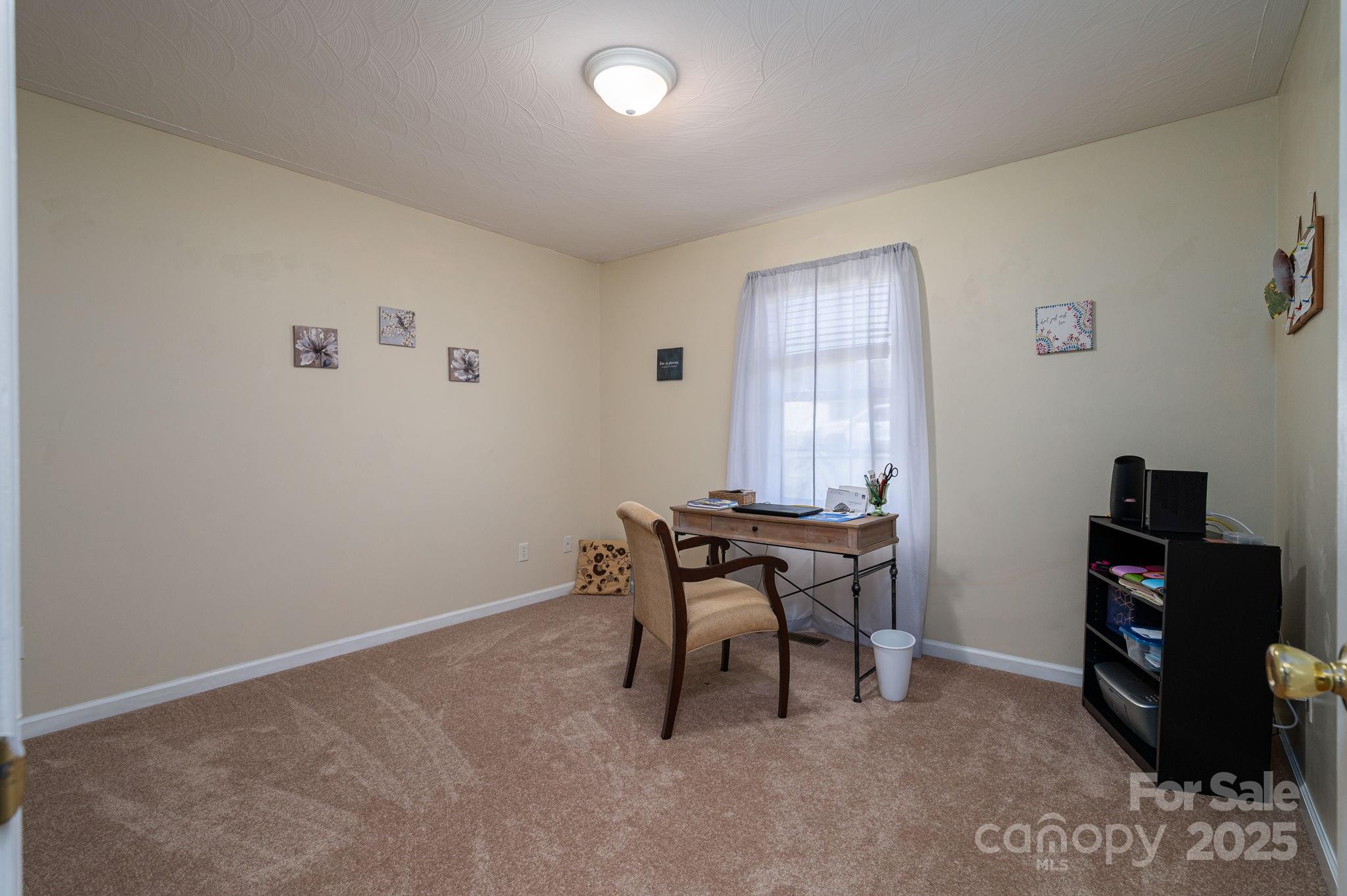 1371 Millrace Drive Conover, NC 28613 - Photo 23 of 36 a workspace with furniture and window