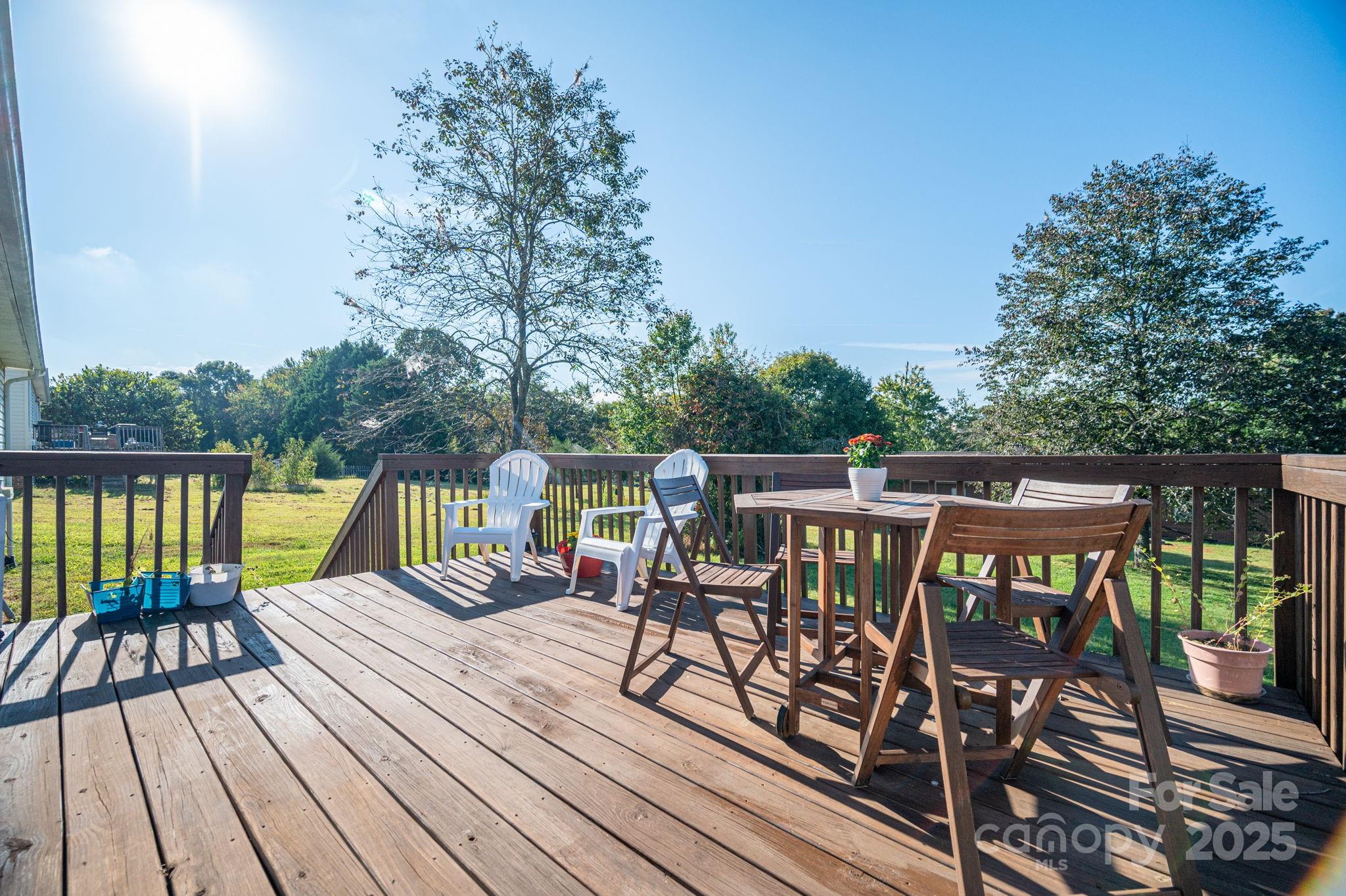 1371 Millrace Drive Conover, NC 28613 - Photo 26 of 36 a view of a patio on wooden deck and mountain view