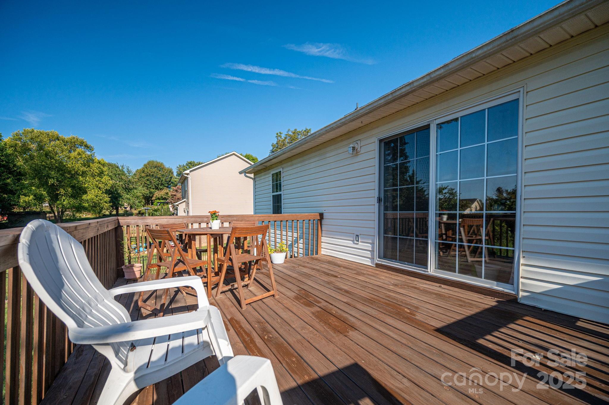 1371 Millrace Drive Conover, NC 28613 - Photo 27 of 36 a view of a roof deck with wooden floor and fence