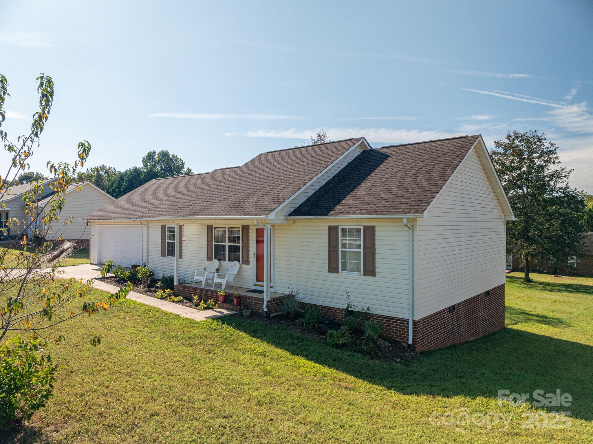 1371 Millrace Drive Conover, NC 28613 - Photo 28 of 36 a view of a house with a backyard