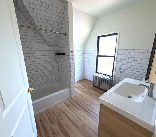 a bathroom with a sink and a bathtub