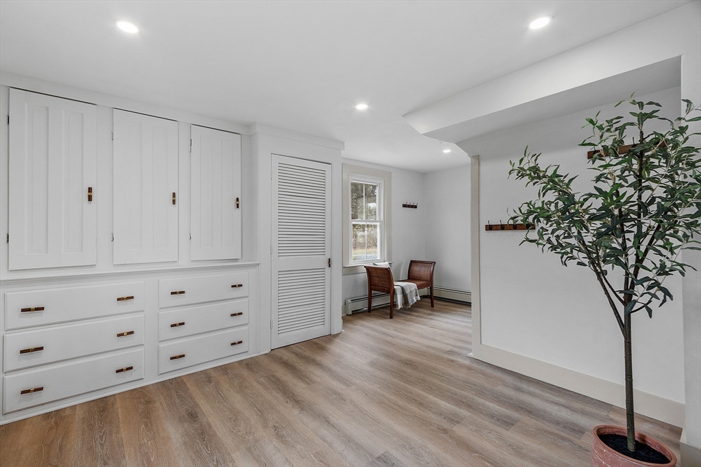 453 Main Street Northborough, MA 01532 - Photo 17 of 42 a view of room with furniture and wooden floor