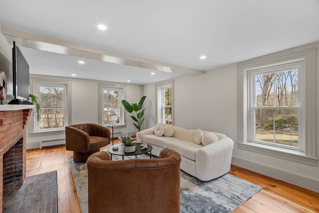 453 Main Street Northborough, MA 01532 - Photo 22 of 42 a living room with furniture and a window