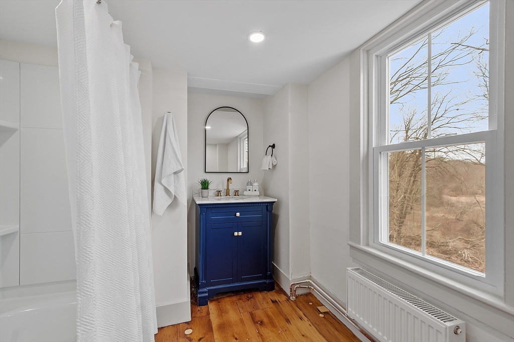 453 Main Street Northborough, MA 01532 - Photo 27 of 42 a room with window and tub