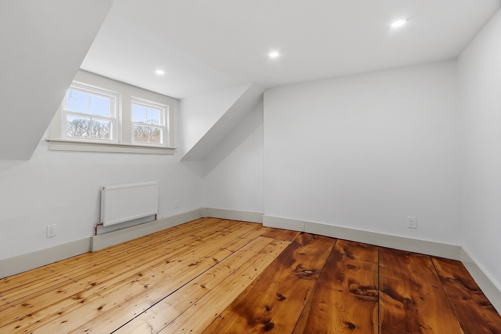 453 Main Street Northborough, MA 01532 - Photo 30 of 42 a view of empty room with wooden floor