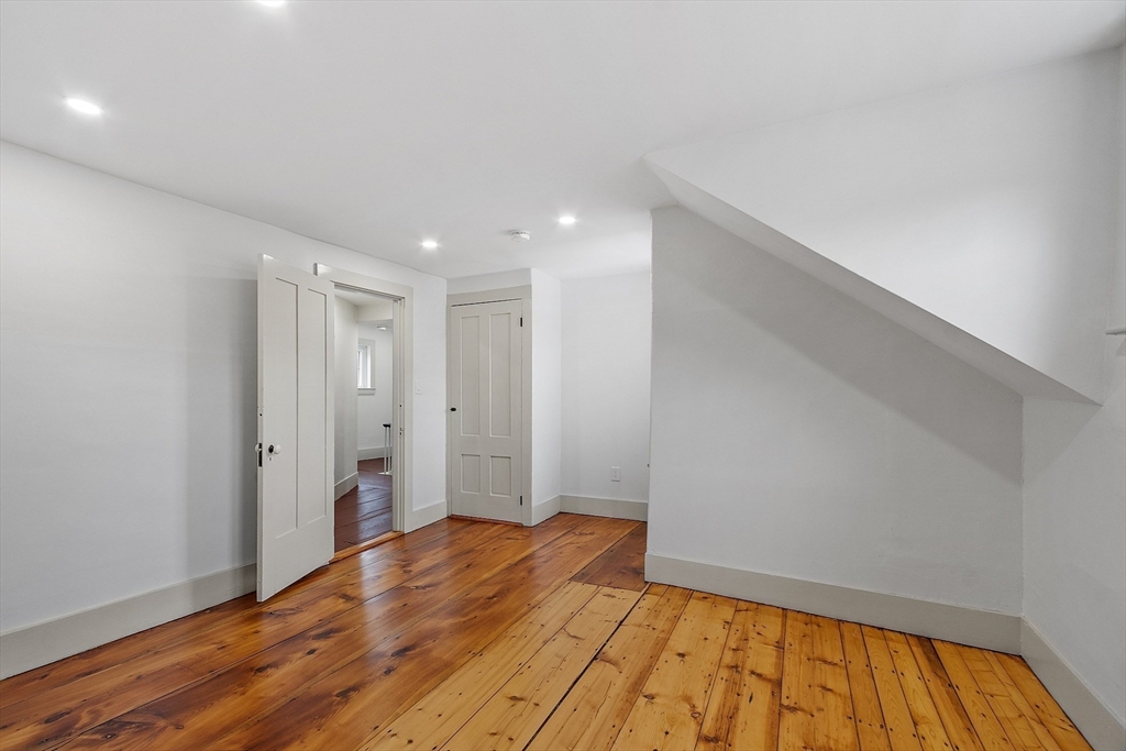 453 Main Street Northborough, MA 01532 - Photo 31 of 42 a view of empty room with wooden floor