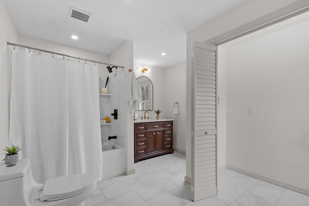 453 Main Street Northborough, MA 01532 - Photo 34 of 42 a large bathroom with a shower and a sink