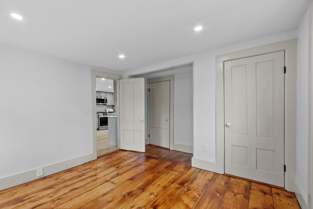 453 Main Street Northborough, MA 01532 - Photo 37 of 42 a view of empty room with wooden floor