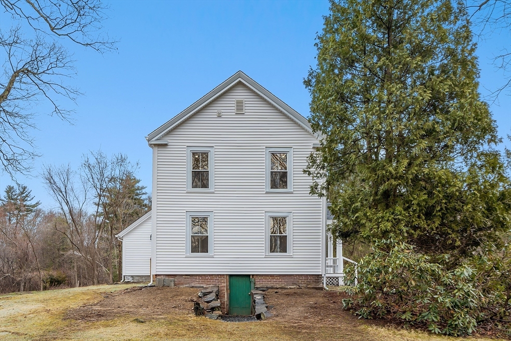 453 Main Street Northborough, MA 01532 - Photo 38 of 42 a view of a house with a yard