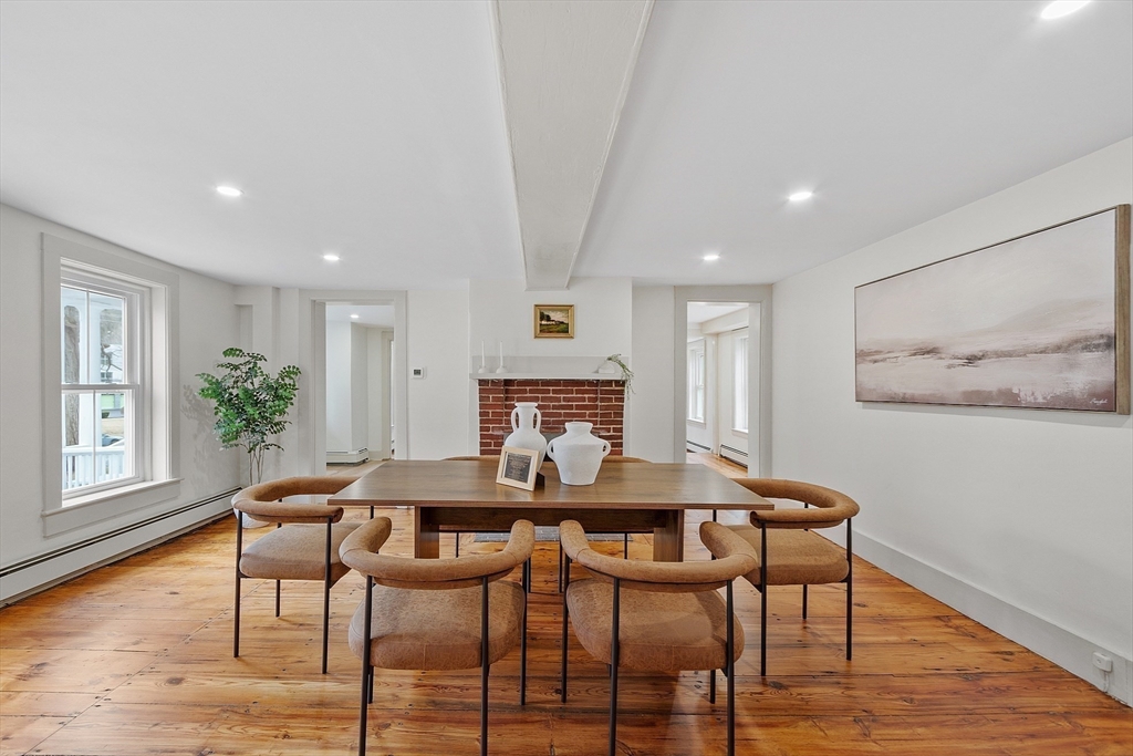 453 Main Street Northborough, MA 01532 - Photo 8 of 42 a view of a dining room with furniture and wooden floor
