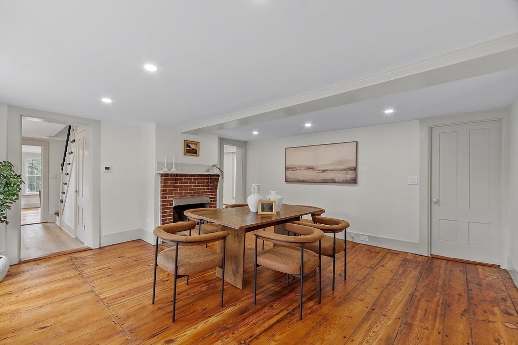 453 Main Street Northborough, MA 01532 - Photo 9 of 42 a view of a workspace with furniture and wooden floor