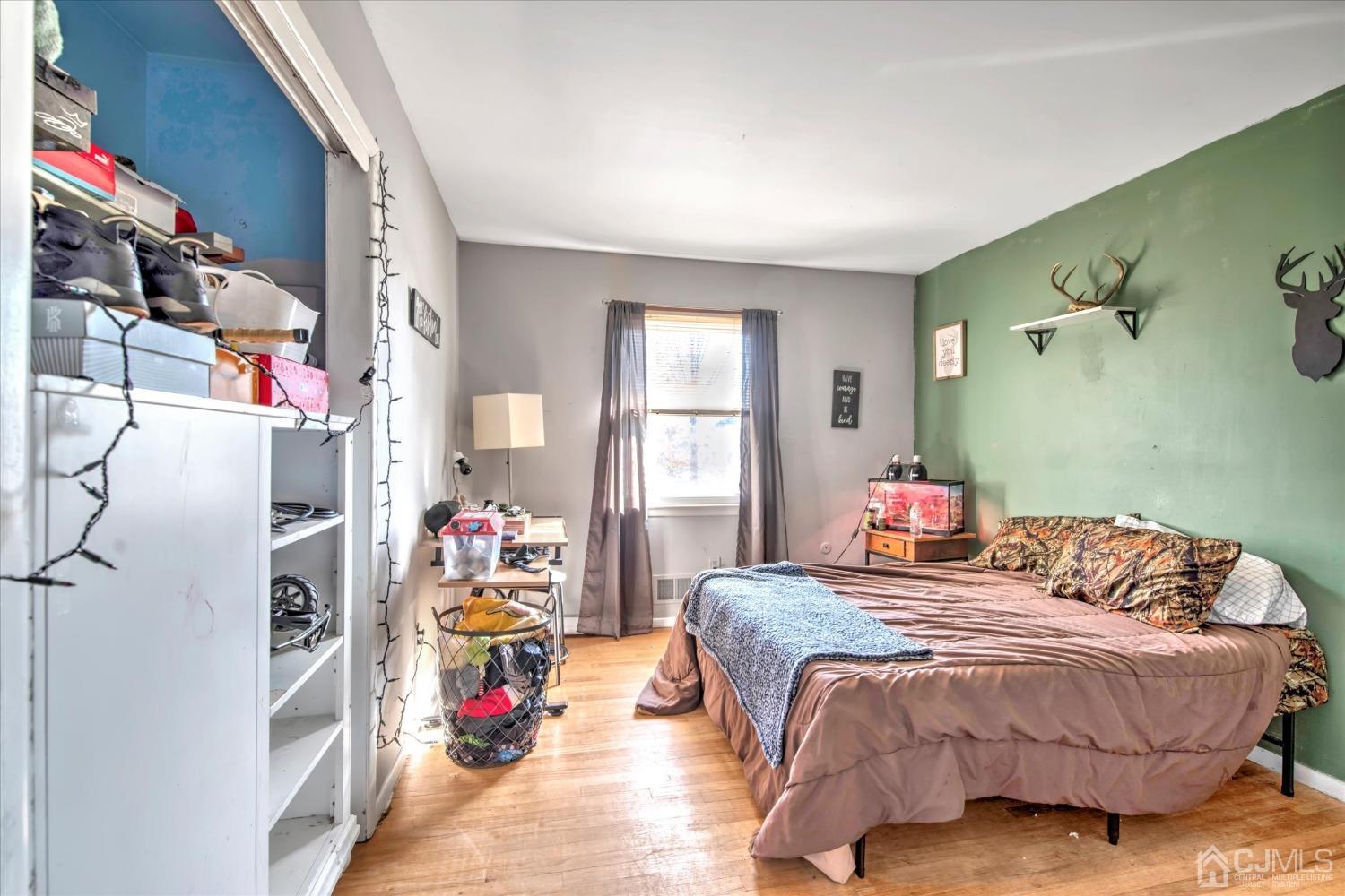 59 Sunnyside Road Howell, NJ 07731 - Photo 12 of 26 a bedroom with bed and window