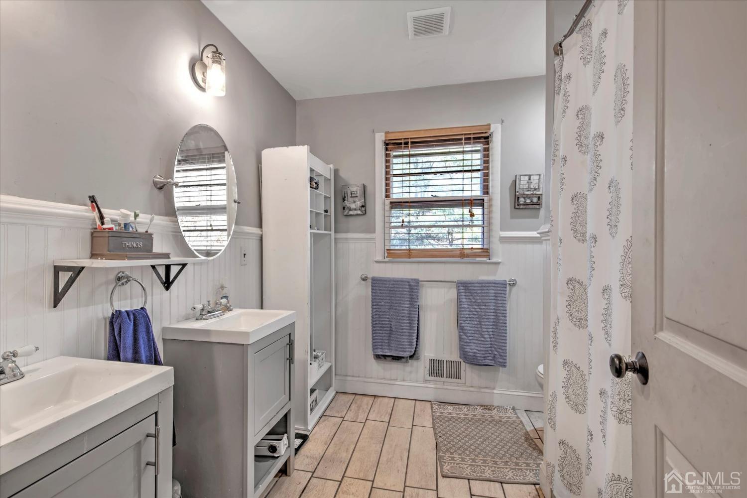 59 Sunnyside Road Howell, NJ 07731 - Photo 15 of 26 a bathroom with a sink toilet and shower