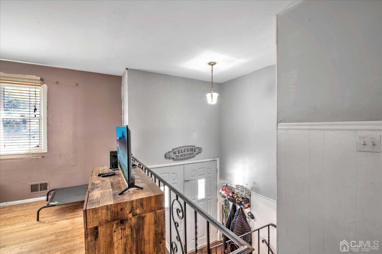 59 Sunnyside Road Howell, NJ 07731 - Photo 2 of 26 a view of a room with gym equipment