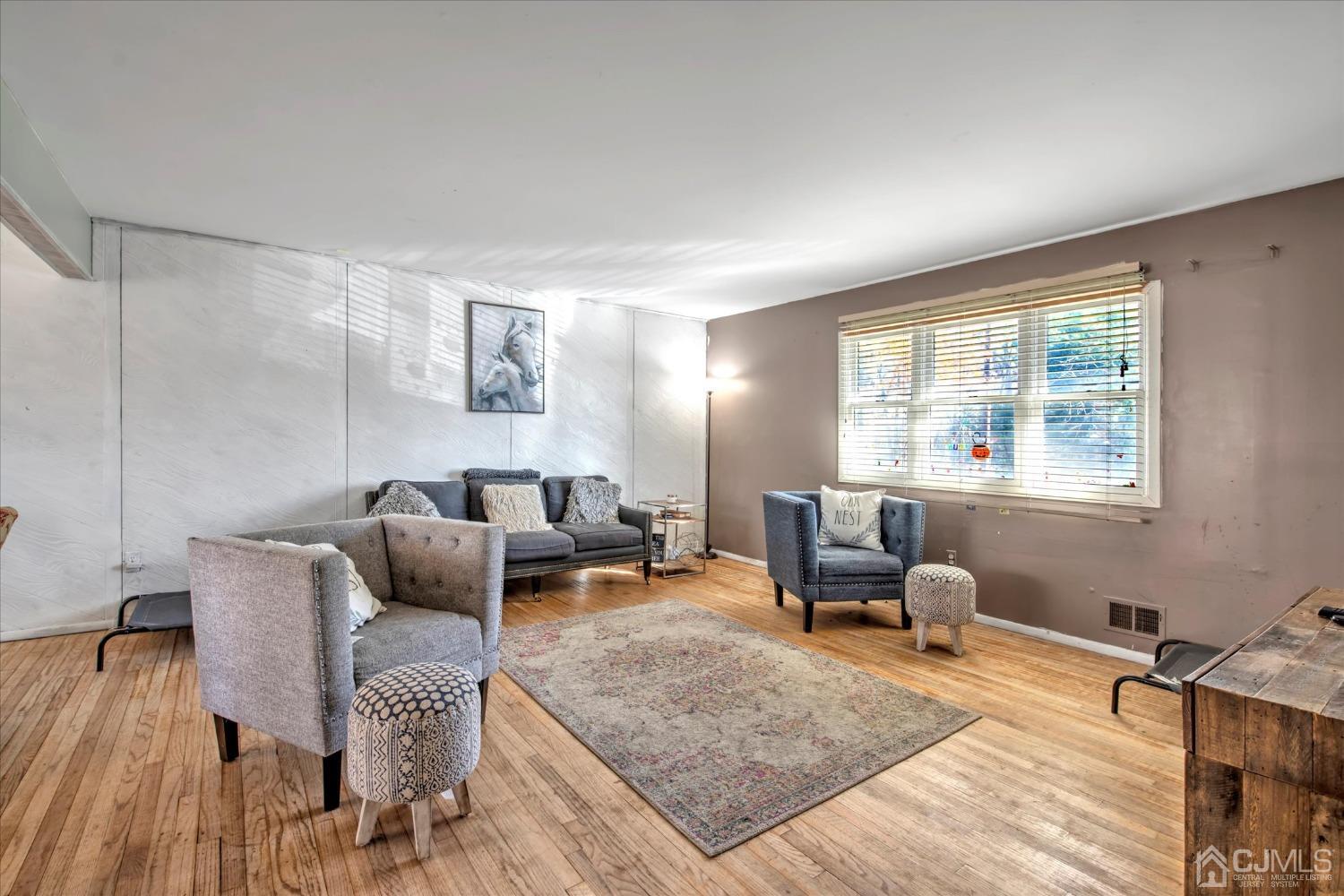 59 Sunnyside Road Howell, NJ 07731 - Photo 3 of 26 a living room with furniture and a window