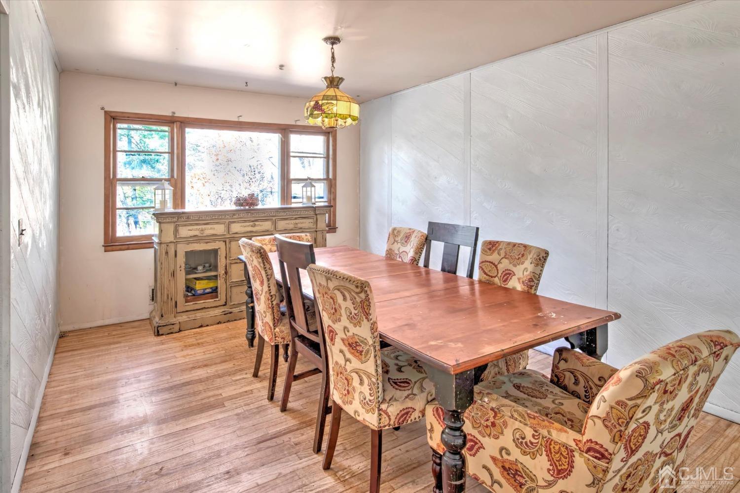 59 Sunnyside Road Howell, NJ 07731 - Photo 5 of 26 a view of a dining room with furniture and wooden floor