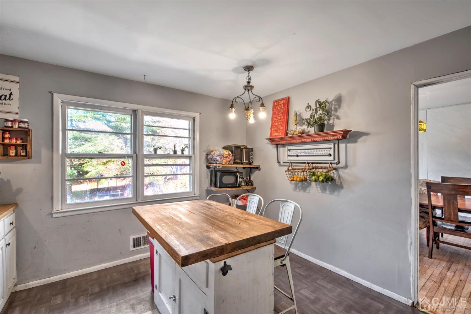 59 Sunnyside Road Howell, NJ 07731 - Photo 7 of 26 a dining room with furniture and window