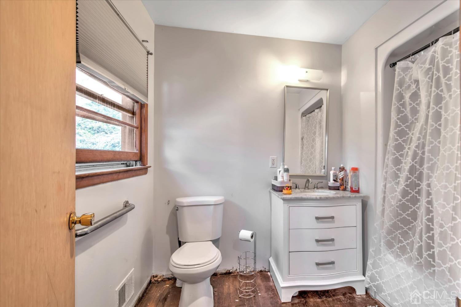 59 Sunnyside Road Howell, NJ 07731 - Photo 10 of 26 a bathroom with a sink toilet and shower
