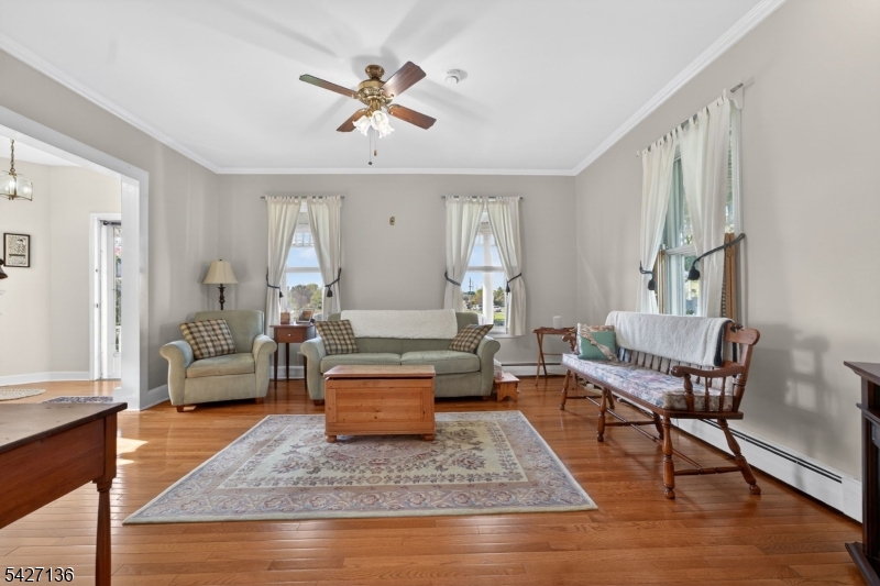 272 Skillman Road Skillman, NJ 08558 - Photo 9 of 49 a living room with furniture and a rug