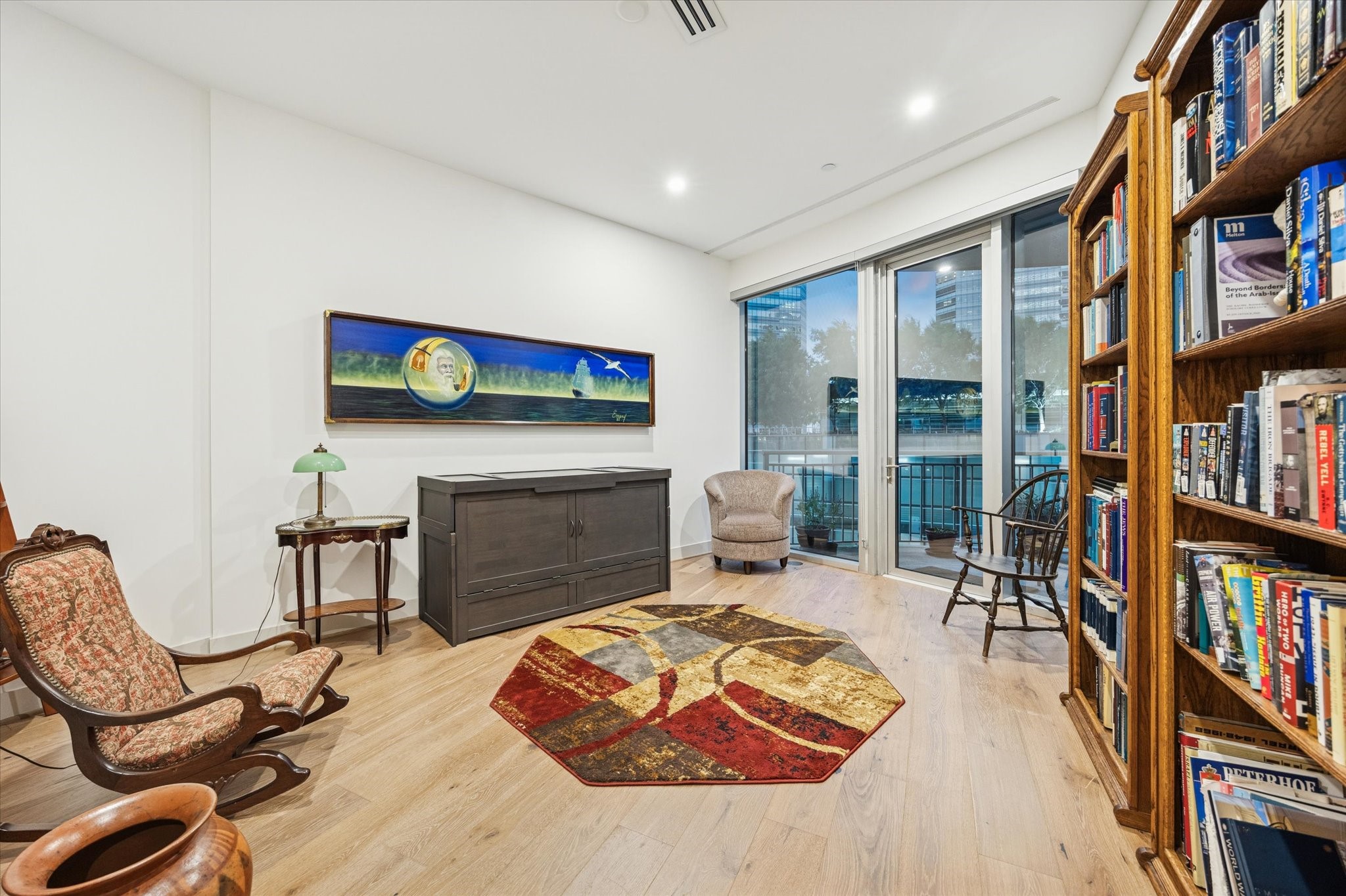 1600 Post Oak Boulevard, Unit 802 Houston, TX 77056 - Photo 14 of 19 This Secondary Bedroom #1 [17 x 11} features White Oak engineered European Collection wood floors, LED lighting, floor to ceiling windows, access to the second balcony and a bathroom with a glass-framed shower.