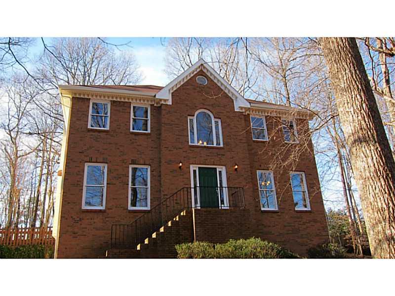 4510 Settles Point Road Suwanee, GA 30024 - Photo 1 of 1 Exterior Front. Stately brick front traditional