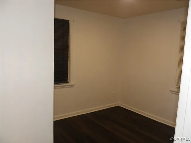 a view of small space with wooden floor