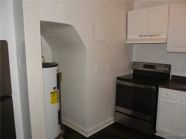 a view of storage and utility room with washer and dryer