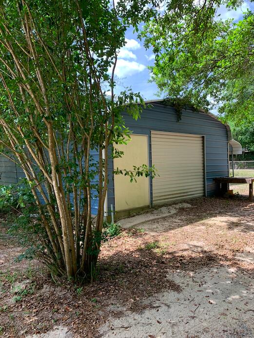 954 Valley Road Crestview, FL 32539 - Photo 17 of 17 a view of a house with a tree