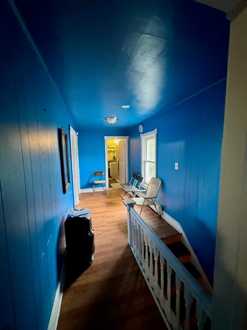 a view of an entryway with a livingroom